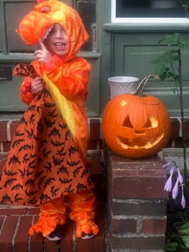 Elliot dressed as a dinosaur for Halloween.